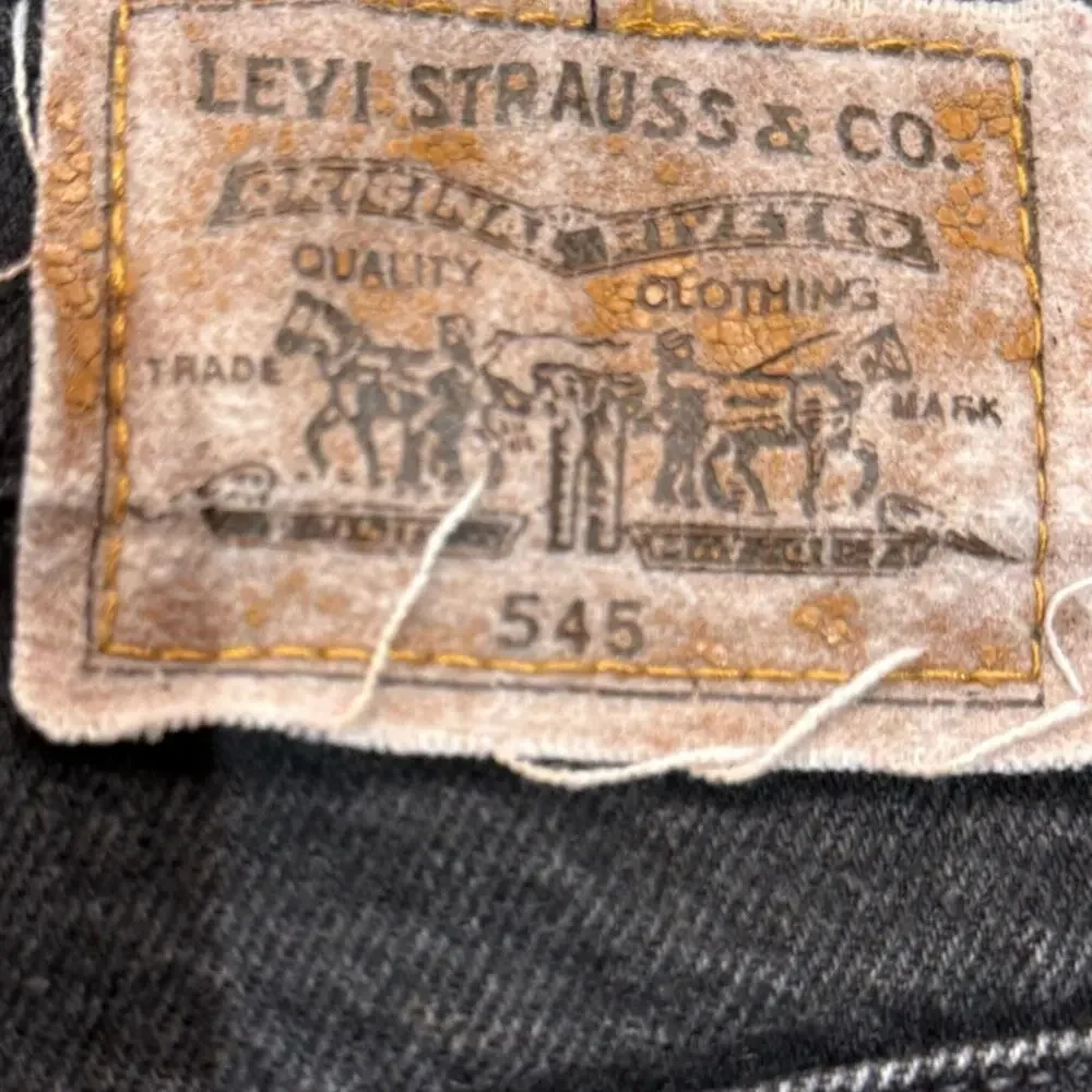 Vintage Levi's Size 36 x 32 Black Cotton Denim 545 Loose Fit Jeans from 1993